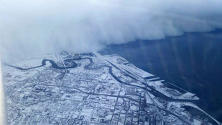 Holy mother of God, check out the giant snow wall swallowing Buffalo